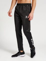 Spodnie do biegania Hummel Core XK Poly. Czarne spodnie sportowe damskie Hummel, l, bez wzorów, z materiału, do biegania. Za 173.45 zł.