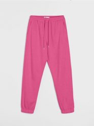 Dresowe spodnie jogger terry - różowy. Czerwone spodnie dresowe damskie Sinsay, l, bez wzorów, z dresówki. Za 29.99 zł.