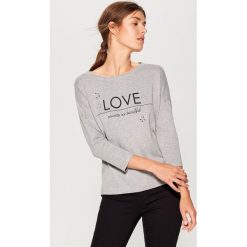 Sweter z aplikacją - Szary. Szare swetry damskie Mohito, l, z aplikacjami, bez kołnierzyka, bez ramiączek, bez kaptura. Za 99.99 zł.