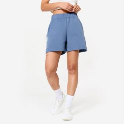 Spodenki fitness damskie Domyos. Białe obuwie sportowe damskie DOMYOS, l, bez wzorów, z bawełny, eleganckie, na fitness i siłownię. W wyprzedaży za 69.99 zł.