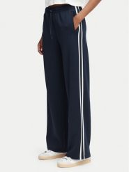 Guess Spodnie dresowe V6YB08 K4286 Granatowy Regular Fit. Niebieskie spodnie dresowe damskie Guess, xl, z aplikacjami, z dresówki. Za 434.99 zł.