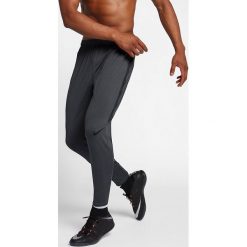 Nike Spodnie męskie Dry SQD Pant KP szary r. XL (859225 014). Spodnie sportowe męskie Nike. Za 178.45 zł.