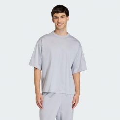 KOSZULKA SOFT LUX. Szare koszulki sportowe męskie Adidas, uniwersalny, bez wzorów, z bawełny, bez kołnierzyka, bez ramiączek, na fitness i siłownię. Za 199.00 zł.