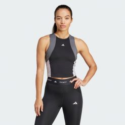 Koszulka Techfit Colorblock Training Crop Tank. Zielone koszulki sportowe damskie Adidas, l, bez wzorów, z materiału, bez kołnierzyka, bez ramiączek, techfit (adidas). Za 179.00 zł.