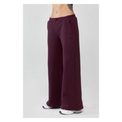 Damskie spodnie sportowe oversize Rough Radical Trip Joggers. Czerwone spodnie sportowe damskie ROUGH RADICAL, bez wzorów, na jogę i pilates. Za 175.92 zł.