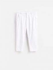 Jeansy Jogger fit - biały. Białe jeansy męskie Reserved. Za 149.99 zł.