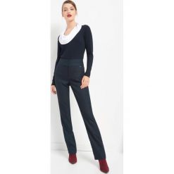 Spodnie z wysokim stanem. Niebieskie spodnie materiałowe damskie marki Orsay, z elastanu. Za 119.99 zł.