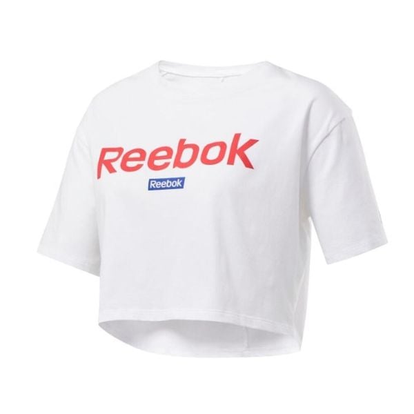 Koszulka sportowa damska Reebok Linear Logo Crop Tee. Białe koszulki sportowe damskie Reebok, bez wzorów, bez kołnierzyka, bez ramiączek. Za 118.00 zł.