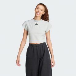 Koszulka City Escape Baby. Czarne koszulki sportowe damskie Adidas, xl, bez wzorów, z materiału, sportowe, bez kołnierzyka. W wyprzedaży za 83.40 zł.