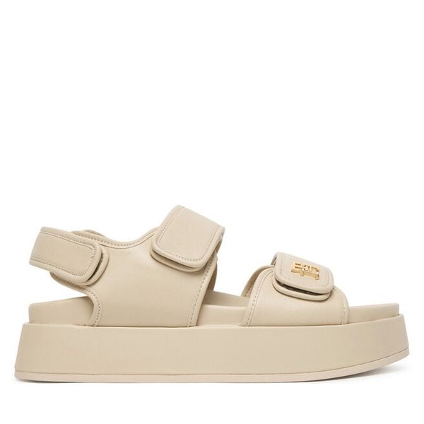 Sandały Tommy Hilfiger. Brązowe sandały damskie Tommy Hilfiger, bez wzorów, bez obcasa, na koturnie, bez zapięcia. Za 374.99 zł.