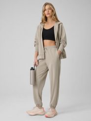 4F Spodnie z szerokimi nogawkami z modalem damskie - beżowe S. Brązowe spodnie dresowe damskie 4f, s, bez wzorów, z dresówki. Za 189.99 zł.