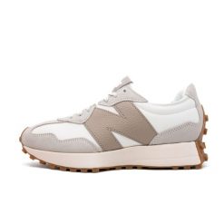 Damskie tenisówki New Balance. Brązowe trampki i tenisówki damskie New Balance, bez wzorów, z materiału, eleganckie, bez zapięcia. Za 753.99 zł.