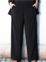 Wiskozowe spodnie wide leg PLUS SIZE - czarny. Czarne spodnie materiałowe damskie Sinsay, l, bez wzorów, z wiskozy. Za 49.99 zł.