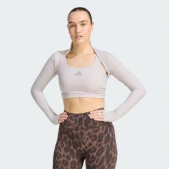 Bolero Power Essentials Workout Contour. Fioletowe obuwie sportowe damskie Adidas, bez wzorów, z tkaniny, na fitness i siłownię. Za 129.00 zł.