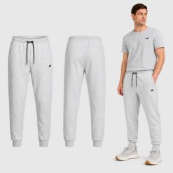 SPODNIE MĘSKIE DRESOWE 4F SPORTOWE DRESY JOGGERY M M1676 SS26. Czarne spodnie sportowe męskie 4f, m, bez wzorów, z bawełny, na fitness i siłownię. Za 159.99 zł.