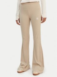 Adidas Legginsy Essentials KD3850 Beżowy Flared Leg. Brązowe legginsy damskie Adidas, s, bez wzorów, z wiskozy. Za 219.99 zł.