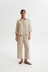 SPODNIE ZORA PIASKOWE XL - Flawless. Spodnie materiałowe damskie Flawless, s, bez wzorów, z gumy. Za 389.00 zł.
