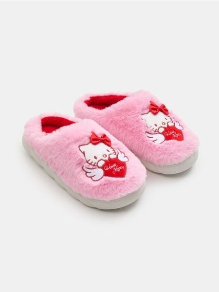 Kapcie z futerkiem Hello Kitty - różowy. Czerwone kapcie damskie Sinsay, bez wzorów. Za 35.99 zł.