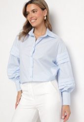 Jasnoniebieska Koszula z Bawełną Ozdobiona Szerokimi Rękawami Edimelia. Niebieskie bluzki damskie Born2be, m, bez wzorów, z bawełny, eleganckie, bez kołnierzyka, bez ramiączek. Za 89.99 zł.