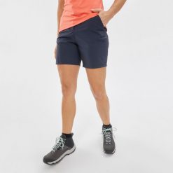 Spodenki turystyczne damskie Quechua MH100. Niebieskie szorty sportowe damskie QUECHUA, l, bez wzorów, z materiału, sportowe, trekkingowe. Za 59.99 zł.