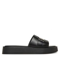 Klapki Calvin Klein. Czarne klapki damskie Calvin Klein, bez wzorów, bez obcasa. Za 329.99 zł.