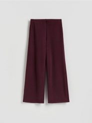 Dzianinowe spodnie z bawełną - ciemnofioletowy. Fioletowe spodnie materiałowe damskie Reserved, l, bez wzorów, z bawełny. Za 99.99 zł.