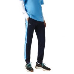Spodnie turystyczne męskie Lacoste Sport. Niebieskie spodnie sportowe męskie Lacoste, na lato, m, bez wzorów, z dresówki, trekkingowe. Za 297.00 zł.