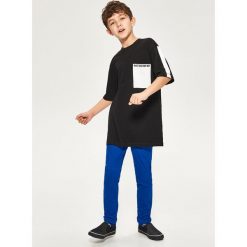 Bawełniane spodnie slim fit - Niebieski. Niebieskie spodnie materiałowe dla chłopców Reserved, m, bez wzorów, z bawełny. Za 129.99 zł.
