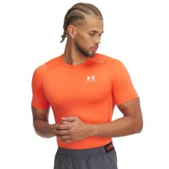 Koszulka Under Armour HeatGear® Armour. Białe buty sportowe męskie Under Armour, bez zapięcia, na fitness i siłownię. Za 129.00 zł.