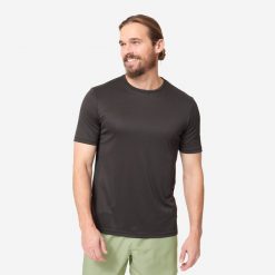 Koszulka UV surfingowa męska Olaian Water T-shirt krótki rękaw. Czarne koszulki sportowe męskie OLAIAN, m, bez wzorów, z dzianiny, sportowe, bez kołnierzyka. Za 39.99 zł.