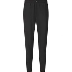 Damskie spodnie dresowe Athlecia Amisa V2. Czarne spodnie dresowe damskie Athlecia, s, bez wzorów, z dresówki, do biegania. Za 193.50 zł.