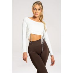 Koszulka fitness damska Gym Glamour regulowana z długimi rękawami. Brązowe bluzy sportowe damskie GYM GLAMOUR, s, bez wzorów, glamour, bez kołnierzyka. Za 149.99 zł.