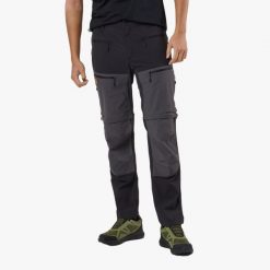 Spodnie Wędrówki męskie Swedemount Lofoten Stretch Zip-Off Pants wodoodporne. Czarne spodnie sportowe męskie SWEDEMOUNT, m, bez wzorów, z tkaniny, trekkingowe. Za 449.99 zł.