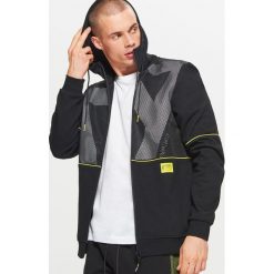 Bluza z kapturem z kolekcji FUUTURISTIC YOUTH - Czarny. Bluzy męskie marki KALENJI. W wyprzedaży za 69.99 zł.