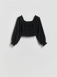 Bluzka z marszczeniem - czarny. Czarne bluzki damskie Reserved, l, bez wzorów, z dzianiny, bez kołnierzyka, bez ramiączek. Za 59.99 zł.