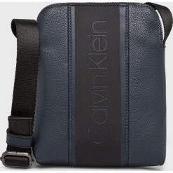 Calvin Klein - Saszetka. Czarne saszetki męskie Calvin Klein, z materiału. Za 299.90 zł.