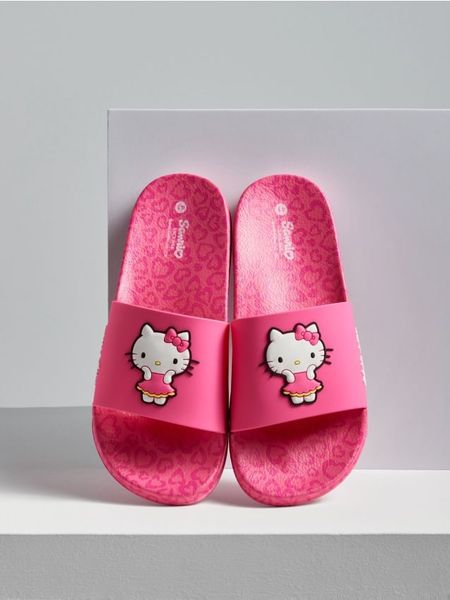 Klapki Hello Kitty - różowy. Czerwone klapki damskie Sinsay, bez wzorów, bez obcasa. Za 35.99 zł.