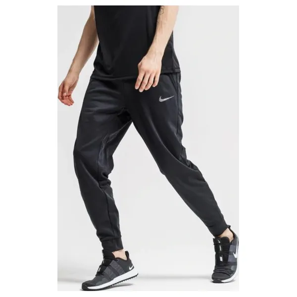 Nike Spodnie M Nk Thrma Pant Taper , czarny, rozmiar XL. Czarne spodnie sportowe męskie Nike, m, bez wzorów, z materiału, na fitness i siłownię, dri-fit (nike). Za 209.99 zł.