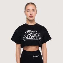 Koszulka damska fitness oversize czarna Thrive Cropped. Czarne koszulki sportowe damskie GYMBEAM, m, bez wzorów, z bawełny, bez kołnierzyka, bez ramiączek, na fitness i siłownię. Za 80.90 zł.