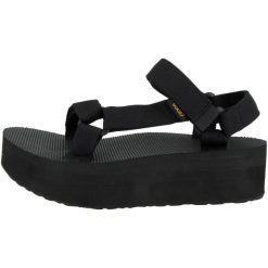Sandały Teva Model W Flatform Univers Kolor Czarny. Czarne sandały damskie Teva, bez wzorów, z materiału, bez obcasa, bez zapięcia. W wyprzedaży za 277.25 zł.
