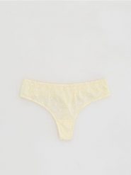 Majtki stringi z ażurowym haftem - jasnożółty. Żółte stringi damskie Reserved, l, w ażurowe wzory, z bawełny. Za 49.99 zł.