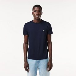 T-shirt Lacoste męski niebieski. Niebieskie t-shirty męskie Lacoste, l, bez wzorów, z bawełny, eleganckie, bez kołnierzyka. Za 261.05 zł.