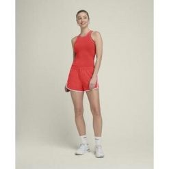 Spodenki damskie Wilson Team W. Czerwone obuwie sportowe damskie Wilson, bez wzorów, sportowe, tenisowe. Za 169.99 zł.