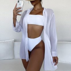 Koszula plażowa z lekkiej dzianiny na lato Yllka. Białe koszule nocne damskie Intica, s, bez wzorów, z dzianiny. Za 129.00 zł.