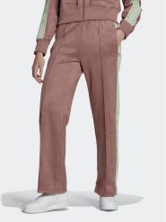 Adidas Spodnie dresowe HM1518 Brązowy Regular Fit. Brązowe spodnie dresowe damskie Adidas, bez wzorów, z dresówki. Za 349.99 zł.