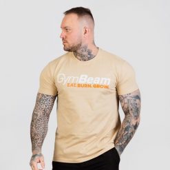 Koszulka męska fitness regular piaskowa Grow. Białe koszulki sportowe męskie GYMBEAM, m, bez wzorów, z bawełny, bez kołnierzyka, bez ramiączek, na fitness i siłownię. Za 55.90 zł.