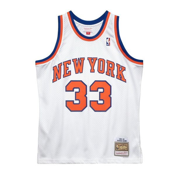 Koszulka New York Knicks Patrick Ewing 1985/86. Białe koszulki sportowe męskie Mitchell & Ness, bez wzorów, z meshu, bez kołnierzyka, bez ramiączek, do koszykówki. W wyprzedaży za 421.00 zł.