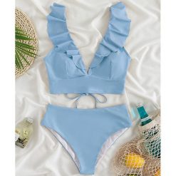 Dwuczęściowy strój kąpielowy z falbankami i wysoką talią Iolanthe. Niebieskie bikini damskie Intica, l, bez wzorów. Za 149.00 zł.