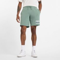 Spodenki męskie New Balance MS51940DKJ – miętowe. Zielone szorty męskie New Balance, m, bez wzorów, z bawełny, klasyczne. Za 169.99 zł.