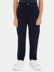 Tommy Hilfiger Spodnie materiałowe KB0KB08837 Granatowy Regular Fit. Niebieskie spodnie materiałowe dla chłopców Tommy Hilfiger, bez wzorów, z bawełny. Za 399.99 zł.